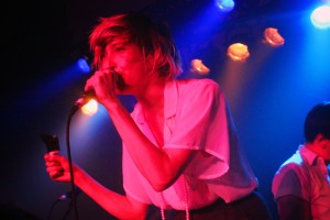 Fay performing with July Talk.